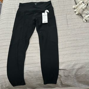 Black workout leggings, size 8. Brand: Layer 8. Never worn. Smoke free house.